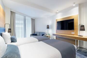 Фото номера Двухместный номер Делюкс с 2 отдельными кроватями Отель Seaside Park Hotel г. Колобжег 2