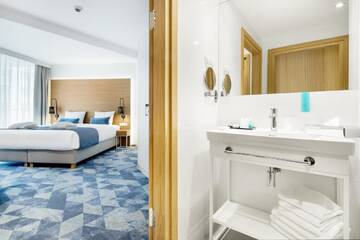 Фото номера Улучшенный двухместный номер с 1 кроватью Отель Seaside Park Hotel г. Колобжег 4