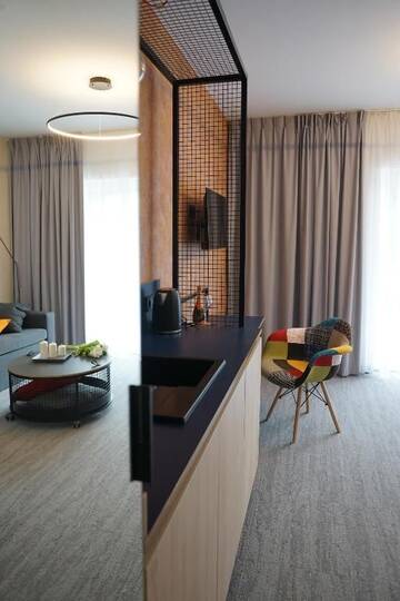 Фото номера Стандартный двухместный номер с 1 кроватью Апарт-отели IND.U Apartamenty г. Колобжег 21